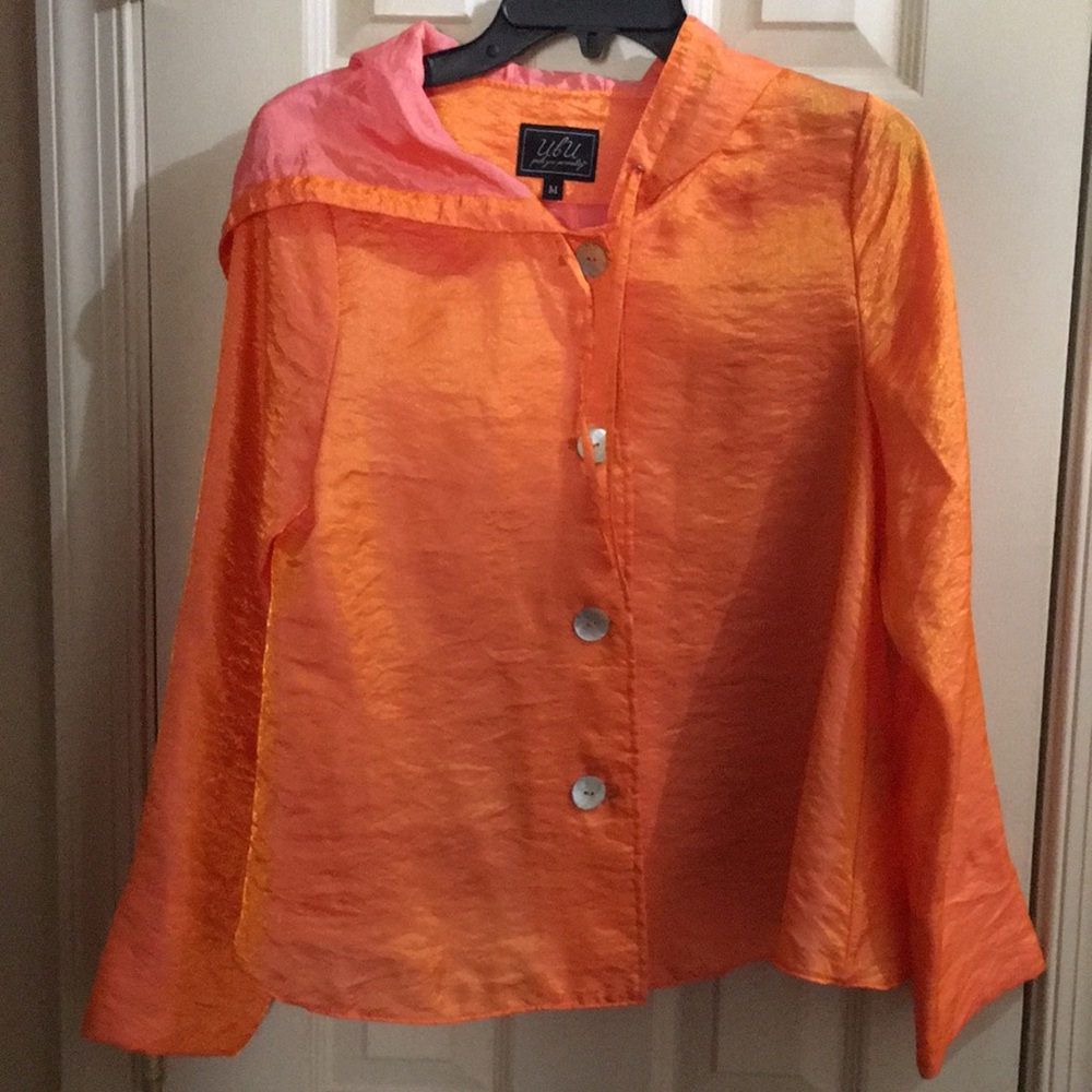 Orange rain coat, size medium